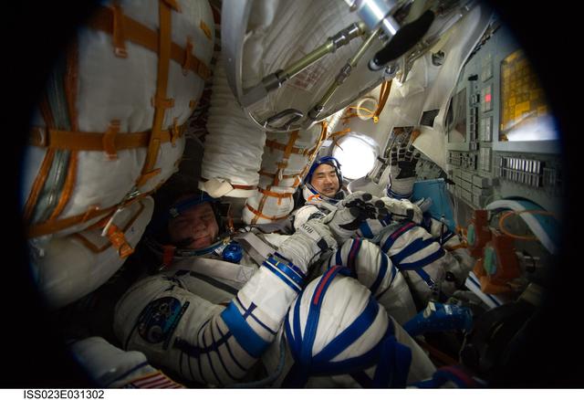 NASA image: Crewmembers in Soyuz TMA-17/21S during Sokol Suit Leak Check
