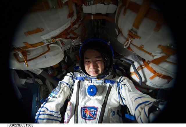 NASA image: Noguchi in Soyuz TMA-17/21S during Sokol Suit Leak Check