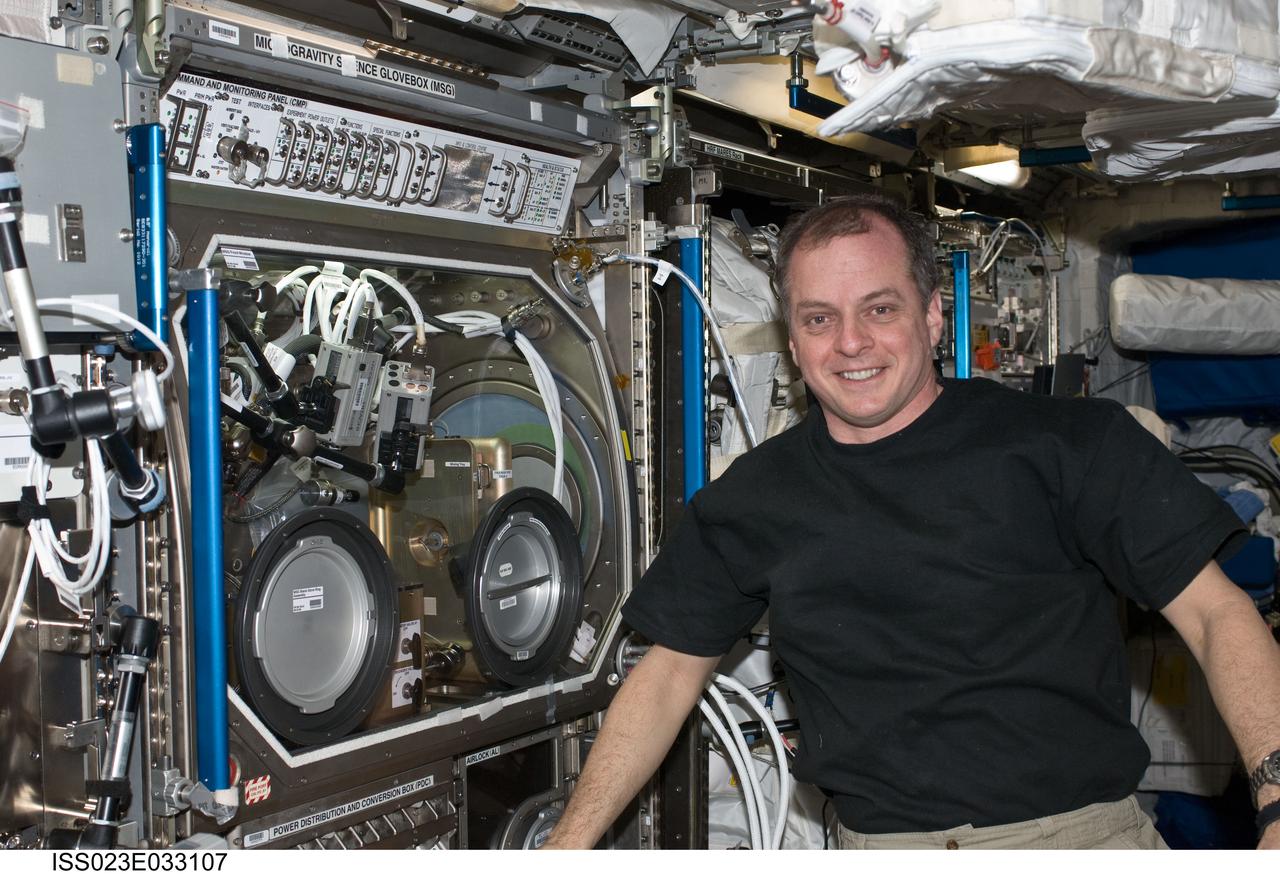 ISS023-E-033107 (6 May 2010) --- NASA astronaut T.J. Creamer, Expedition 23 flight engineer, is pictured near the Microgravity Science Glovebox (MSG) located in the Columbus laboratory of the International Space Station.