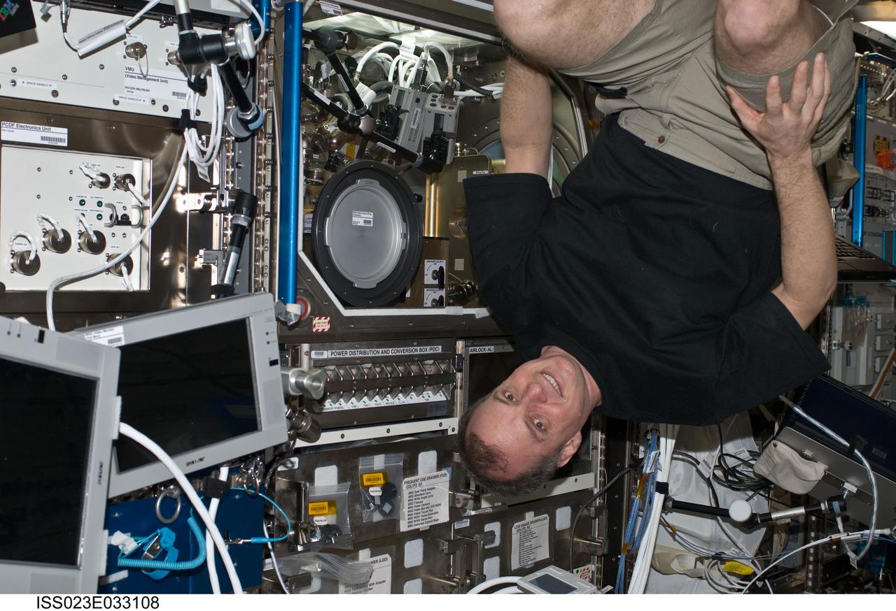 ISS023-E-033108 (6 May 2010) --- NASA astronaut T.J. Creamer, Expedition 23 flight engineer, is pictured near the Microgravity Science Glovebox (MSG) located in the Columbus laboratory of the International Space Station.