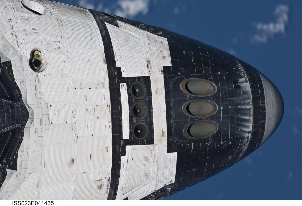 ISS023-E-041435 (16 May 2010) --- This close-up view of the nose of space shuttle Atlantis was provided by an Expedition 23 crew member during a survey of the approaching STS-132 vehicle prior to docking with the International Space Station. As part of the survey and part of every mission's activities, Atlantis performed a back-flip for the rendezvous pitch maneuver (RPM). The station crew member used a digital still camera with an 800mm focal length, as the two spacecraft were approximately 600 feet (180 meters) apart.