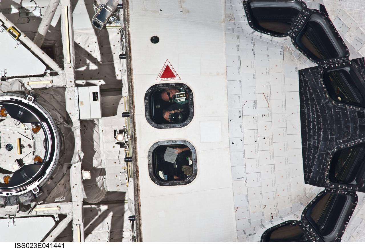 ISS023-E-041441 (16 May 2010) --- This close-up view of the crew cabin and forward portion of the payload bay of space shuttle Atlantis was provided by an Expedition 23 crew member during a survey of the approaching STS-132 vehicle prior to docking with the International Space Station. As part of the survey and part of every mission's activities, Atlantis performed a back-flip for the rendezvous pitch maneuver (RPM). The station crew member used a digital still camera with an 800mm focal length, as the two spacecraft were approximately 600 feet (180 meters) apart.