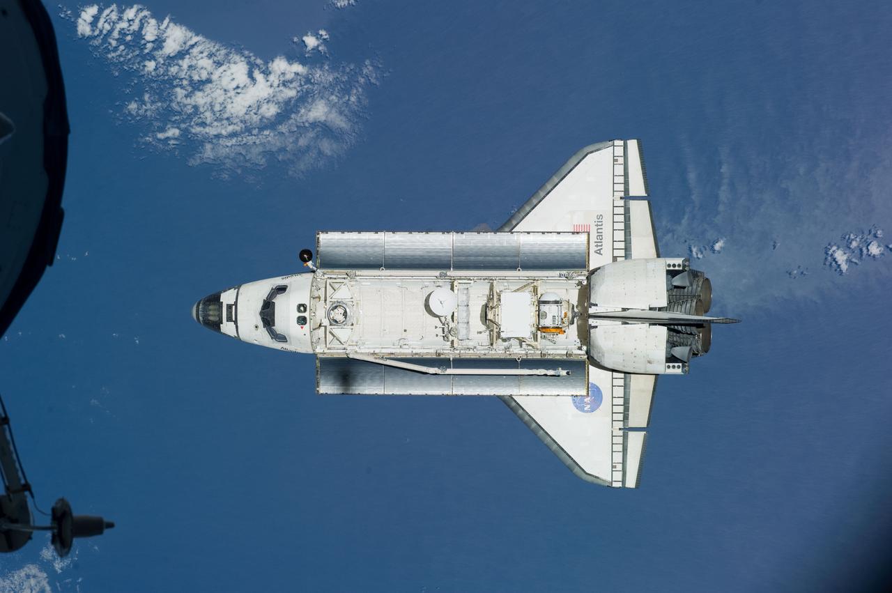 ISS023-E-044569 (16 May 2010) --- Space shuttle Atlantis is featured in this image photographed by an Expedition 23 crew member as the shuttle approaches the International Space Station during STS-132 rendezvous and docking operations. Docking occurred at 9:28 a.m. (CDT) on May 16, 2010.