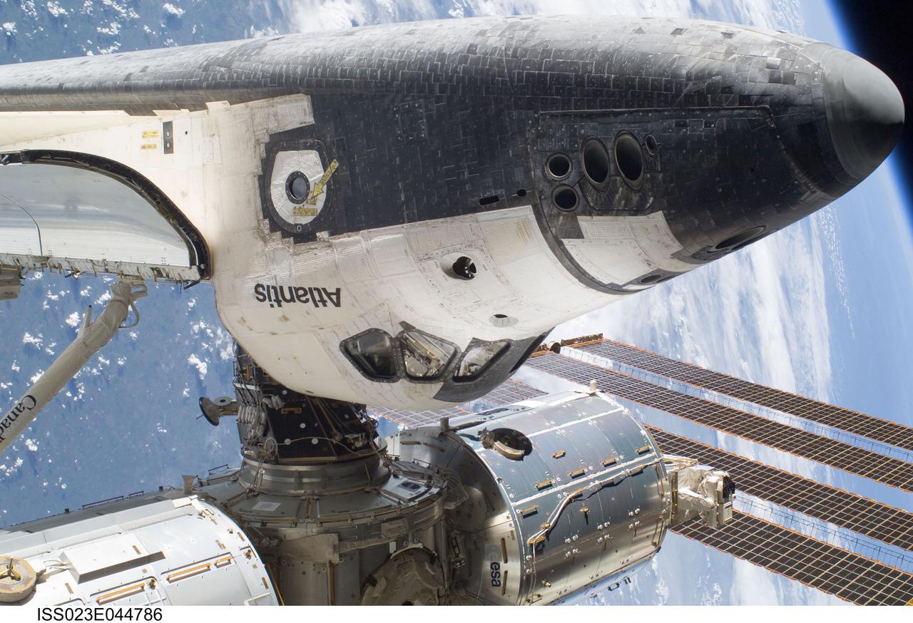 View of the FWD ISS and docked Atlantis during EVA 1