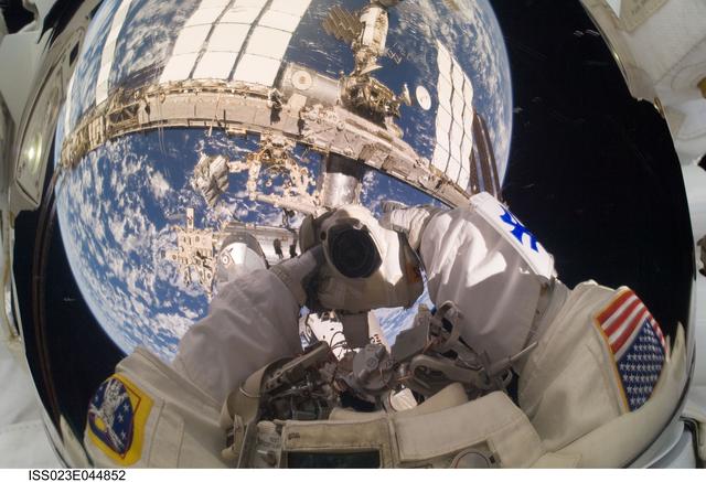 NASA image: Reisman Self-Portrait during EVA 1