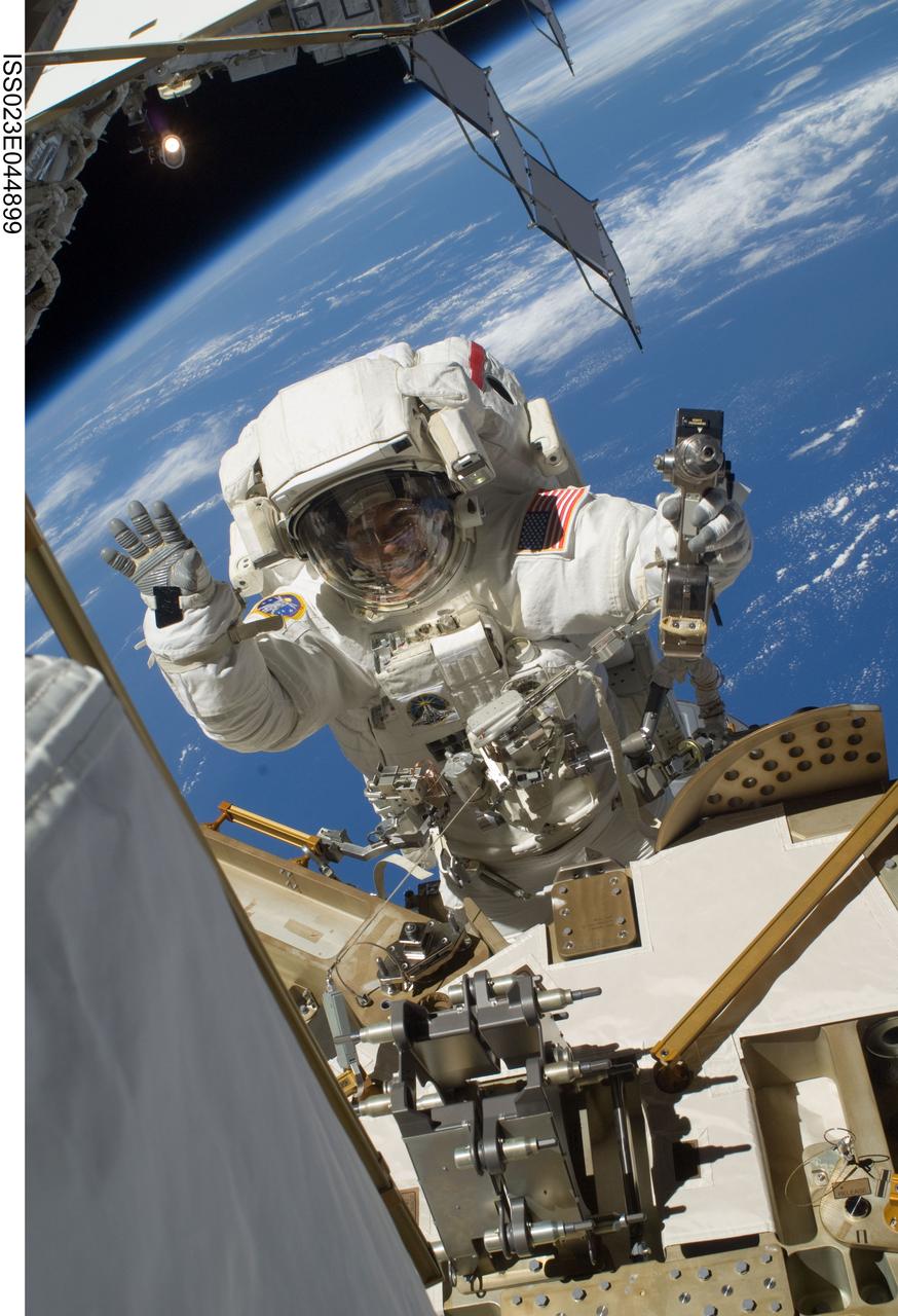 ISS023-E-044899 (17 May 2010) --- NASA astronaut Steve Bowen, STS-132 mission specialist, participates in the mission's first session of extravehicular activity (EVA) as construction and maintenance continue on the International Space Station. During the seven-hour, 25-minute spacewalk, Bowen and NASA astronaut Garrett Reisman (out of frame), mission specialist, loosened bolts holding six replacement batteries, installed a second antenna for high-speed Ku-band transmissions and adding a spare parts platform to Dextre, a two-armed extension for the station?s robotic arm.