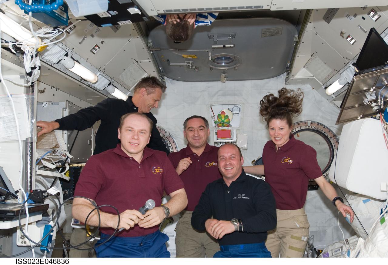 ISS023-E-046836 (18 May 2010) --- Five of the twelve crew members currently on the space shuttle Atlantis/International Space Station tandem are pictured in the Kibo laboratory of the orbital outpost while the shuttle remains docked with the station. Russian cosmonaut Oleg Kotov, Expedition 23 commander, is at left foreground. Also pictured (from the left background) are NASA astronaut Piers Sellers, STS-132 mission specialist; Russian cosmonaut Alexander Skvortsov, Expedition 23 flight engineer; along with NASA astronauts Garrett Reisman, STS-132 mission specialist; and Tracy Caldwell Dyson, Expedition 23 flight engineer.