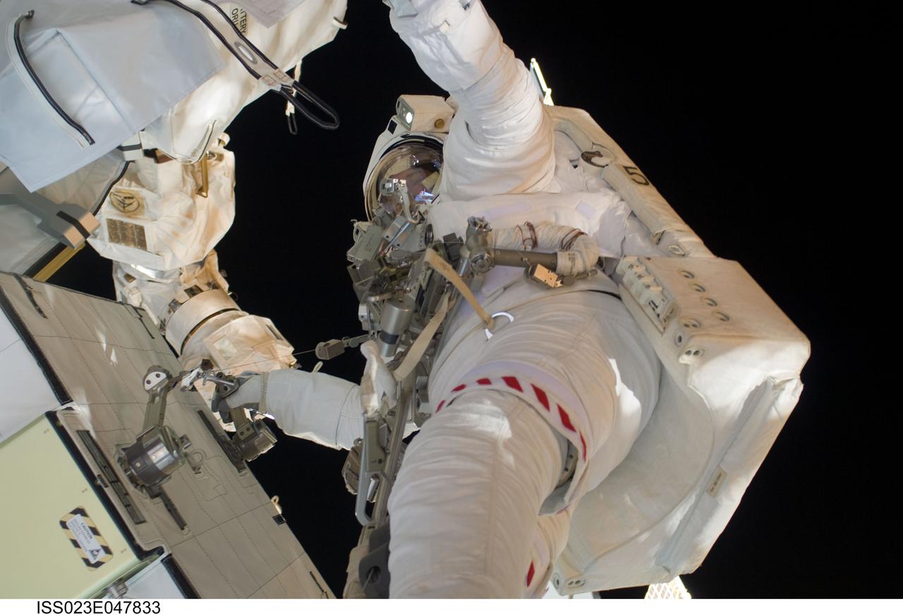 ISS023-E-047833 (21 May 2010) --- NASA astronaut Michael Good, STS-132 mission specialist, participates in the mission?s third and final session of extravehicular activity (EVA) as construction and maintenance continue on the International Space Station. During the six-hour, 46-minute spacewalk, Good and NASA astronaut Garrett Reisman (out of frame), mission specialist, completed the installation of the final two of the six new batteries for the B side of the port 6 solar array. In addition, the astronauts installed a backup ammonia jumper cable between the port 4 and 5 trusses of the station, transferred a Power and Data Grapple Fixture from the shuttle to the station, and reconfigured some tools.