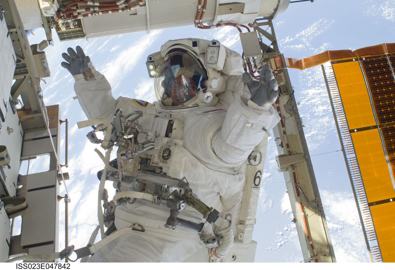 ISS023-E-047842 (21 May 2010) --- NASA astronaut Garrett Reisman, STS-132 mission specialist, participates in the mission?s third and final session of extravehicular activity (EVA) as construction and maintenance continue on the International Space Station. During the six-hour, 46-minute spacewalk, Reisman and NASA astronaut Michael Good (out of frame), mission specialist, completed the installation of the final two of the six new batteries for the B side of the port 6 solar array. In addition, the astronauts installed a backup ammonia jumper cable between the port 4 and 5 trusses of the station, transferred a Power and Data Grapple Fixture from the shuttle to the station, and reconfigured some tools.