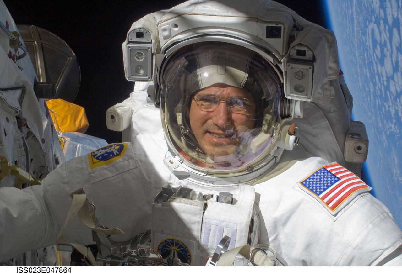 ISS023-E-047864 (21 May 2010) --- NASA astronaut Michael Good, STS-132 mission specialist, participates in the mission?s third and final session of extravehicular activity (EVA) as construction and maintenance continue on the International Space Station. During the six-hour, 46-minute spacewalk, Good and NASA astronaut Garrett Reisman (out of frame), mission specialist, completed the installation of the final two of the six new batteries for the B side of the port 6 solar array. In addition, the astronauts installed a backup ammonia jumper cable between the port 4 and 5 trusses of the station, transferred a Power and Data Grapple Fixture from the shuttle to the station, and reconfigured some tools.