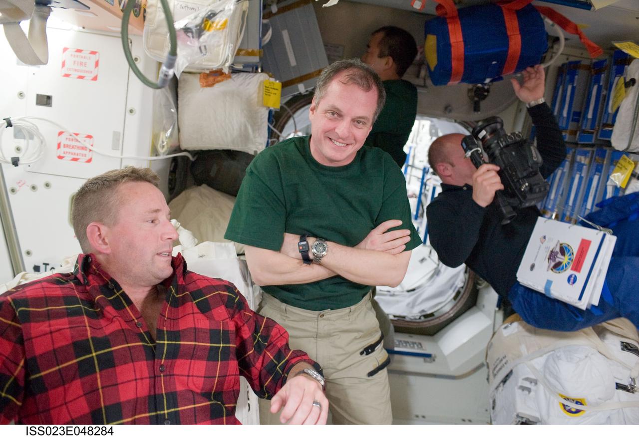ISS023-E-048284 (19 May 2010) --- NASA astronauts Ken Ham (left), STS-132 commander; and T.J. Creamer, Expedition 23 flight engineer, are pictured in the Unity node of the International Space Station while space shuttle Atlantis remains docked with the station. NASA astronaut Garrett Reisman (right), STS-132 mission specialist; and Japan Aerospace Exploration Agency (JAXA) astronaut Soichi Noguchi, Expedition 23 flight engineer, are visible in the background.