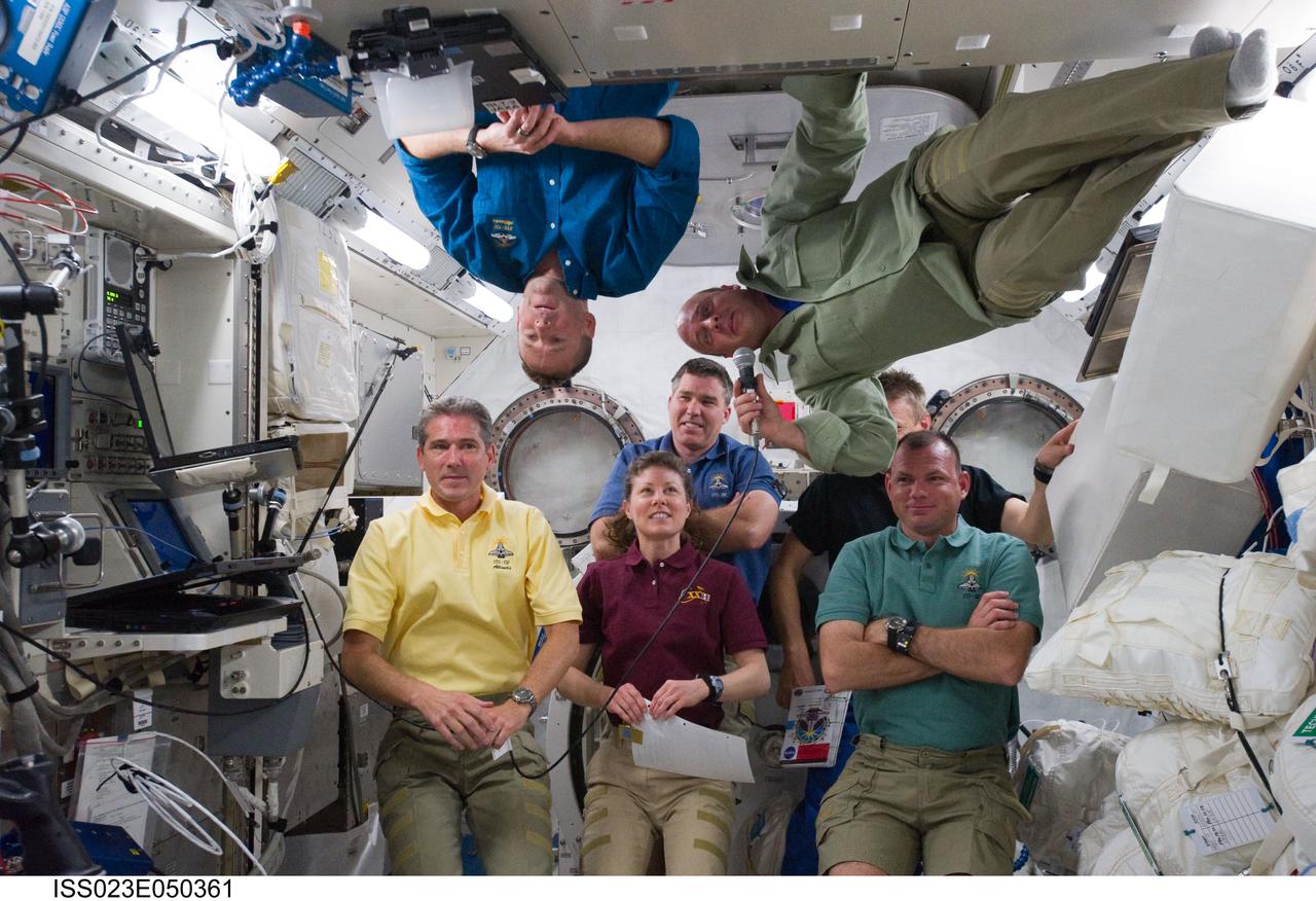 ISS023-E-050361 (22 May 2010) --- NASA astronauts Ken Ham (top left), STS-132 commander; Tony Antonelli, STS-132 pilot; Tracy Caldwell Dyson, Expedition 23 flight engineer; Michael Good, Steve Bowen, Garrett Reisman and Piers Sellers, all STS-132 mission specialists, are pictured in the Kibo laboratory of the International Space Station during an educational event.