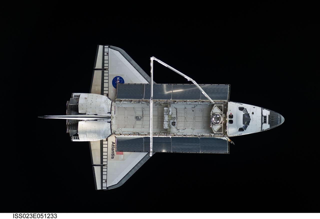 ISS023-E-051233 (23 May 2010) --- Space shuttle Atlantis is featured in this image photographed by an Expedition 23 crew member on the International Space Station soon after the shuttle and station began their post-undocking relative separation. Undocking of the two spacecraft occurred at 10:22 a.m. (CDT) on May 23, 2010, ending a seven-day stay that saw the addition of a new station module, replacement of batteries and resupply of the orbiting outpost.
