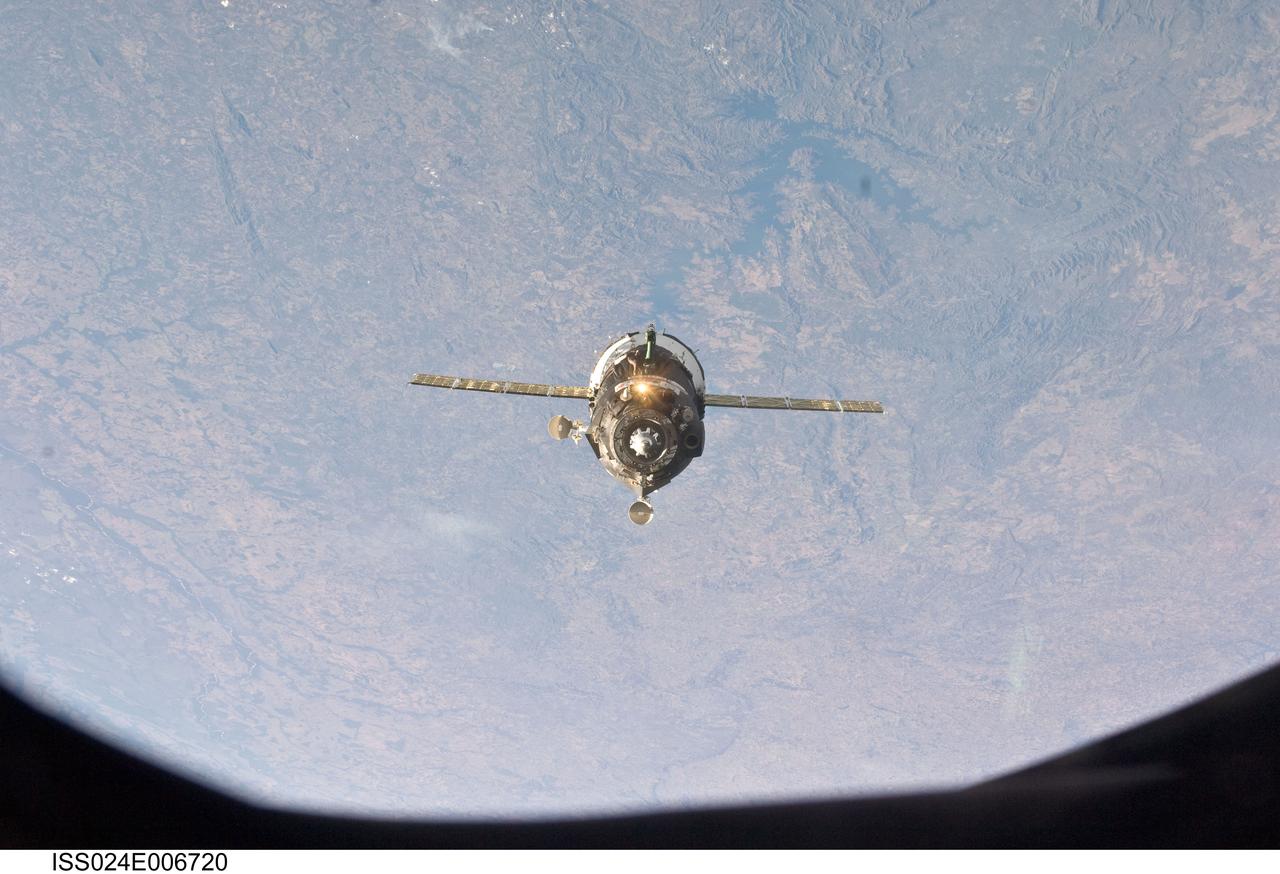 ISS024-E-006720 (28 June 2010) --- The Soyuz TMA-19 spacecraft relocates from the Zvezda Service Module's aft port to the Rassvet Mini-Research Module 1 (MRM1) of the International Space Station. Russian cosmonaut Fyodor Yurchikhin; along with NASA astronauts Doug Wheelock and Shannon Walker, all Expedition 24 flight engineers, undocked their Soyuz spacecraft from Zvezda’s aft end at 3:13 pm. (EDT) on June 28, 2010, and docked it to its new location on the recently installed Rassvet module 25 minutes later.