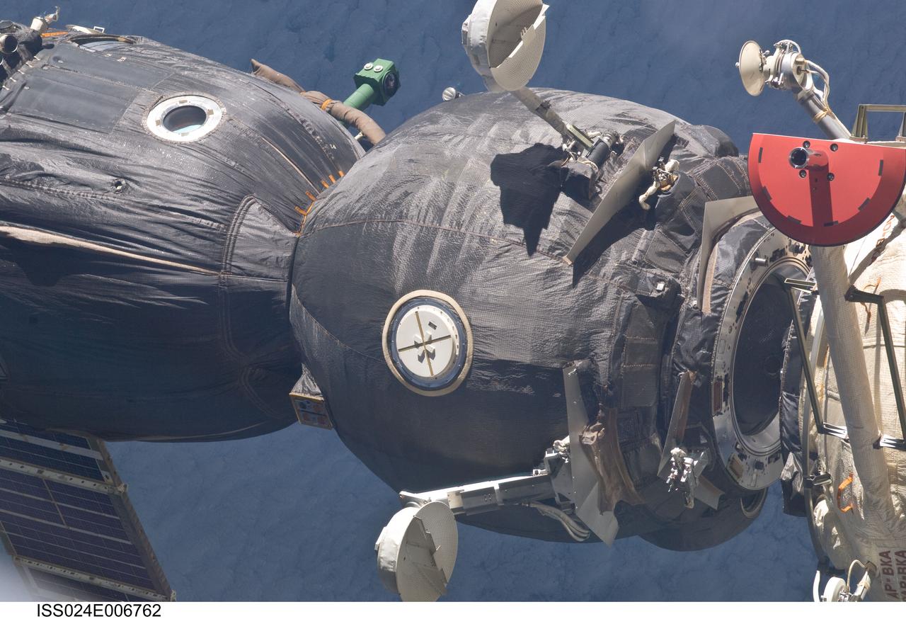 ISS024-E-006762 (28 June 2010) --- The Soyuz TMA-19 spacecraft docks to the Rassvet Mini-Research Module 1 (MRM1) of the International Space Station. Russian cosmonaut Fyodor Yurchikhin; along with NASA astronauts Doug Wheelock and Shannon Walker, all Expedition 24 flight engineers, undocked their Soyuz spacecraft from Zvezda Service Module's aft port at 3:13 pm. (EDT) on June 28, 2010, and docked it to its new location on the recently installed Rassvet module 25 minutes later.