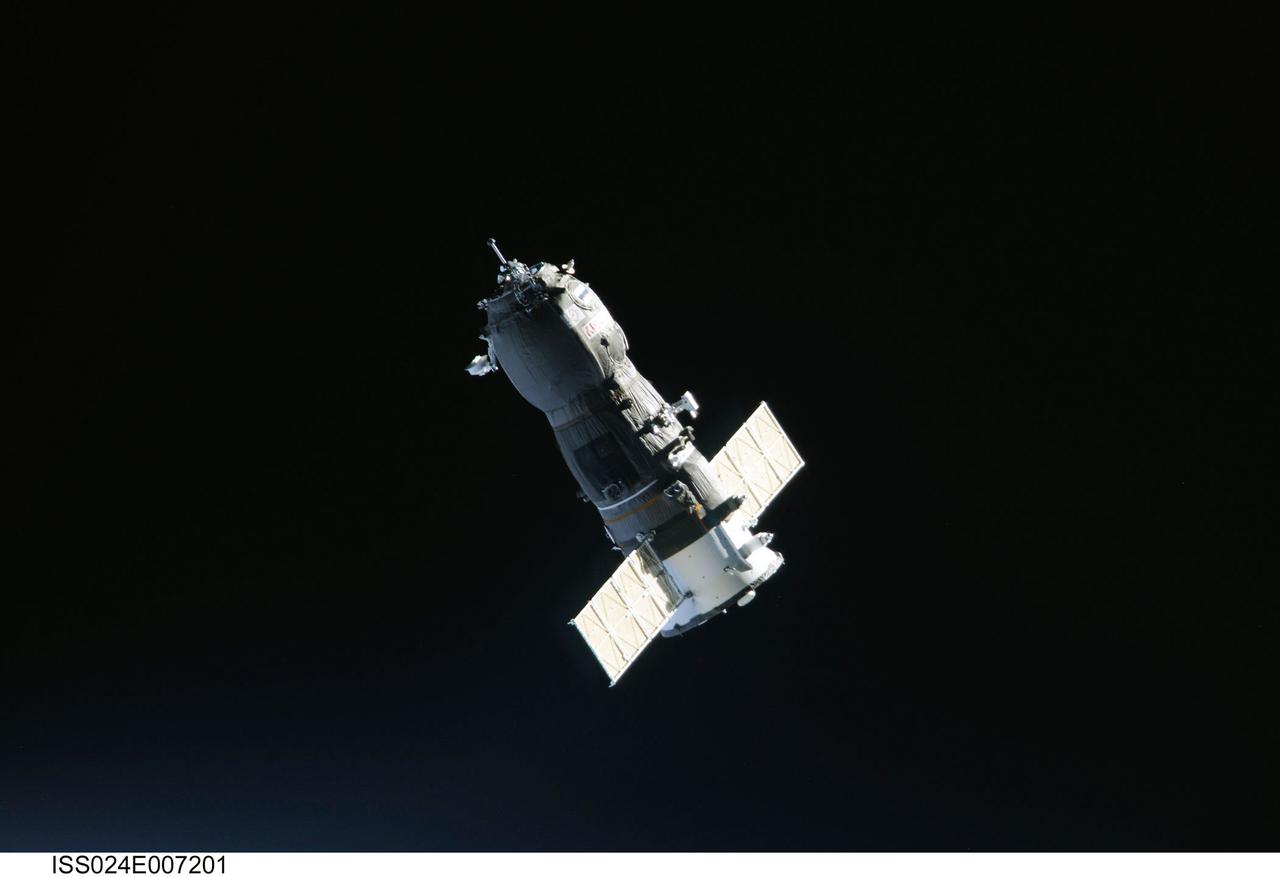 ISS024-E-007201 (2 July 2010) --- The unpiloted ISS Progress 38 resupply vehicle approaches the International Space Station, bringing almost two tons of food, fuel, oxygen, propellant and supplies for the Expedition 24 crew members aboard the station. The attempted docking on July 2, 2010, was aborted when telemetry between the Progress and the space station was lost about 25 minutes before its planned docking. As a result, the Progress vehicle continued on its trajectory and glided past the space station. Later, the Progress successfully docked to the aft end of the Zvezda Service Module at 12:17 p.m. (EDT) on July 4, 2010. The docking was executed flawlessly by Progress? Kurs automated rendezvous system.