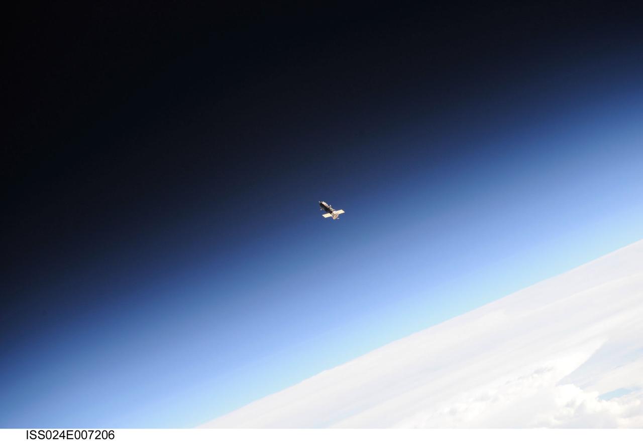 ISS024-E-007206 (2 July 2010) --- The unpiloted ISS Progress 38 resupply vehicle approaches the International Space Station, bringing almost two tons of food, fuel, oxygen, propellant and supplies for the Expedition 24 crew members aboard the station. The attempted docking on July 2, 2010, was aborted when telemetry between the Progress and the space station was lost about 25 minutes before its planned docking. As a result, the Progress vehicle continued on its trajectory and glided past the space station. Later, the Progress successfully docked to the aft end of the Zvezda Service Module at 12:17 p.m. (EDT) on July 4, 2010. The docking was executed flawlessly by Progress? Kurs automated rendezvous system.