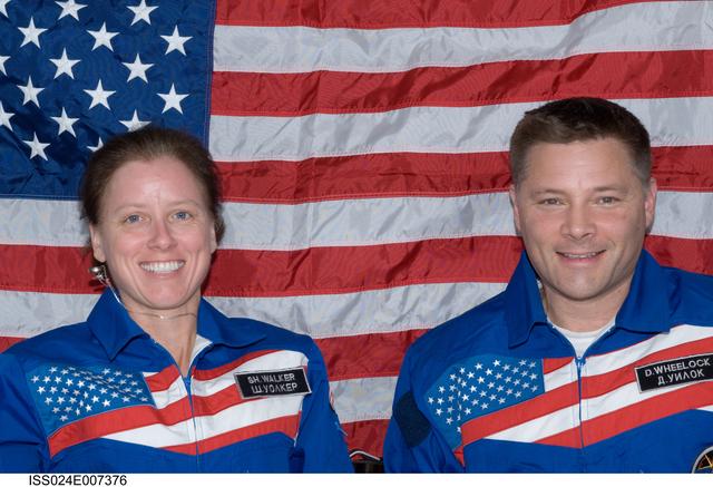 NASA image: Crew Photo in front of flag