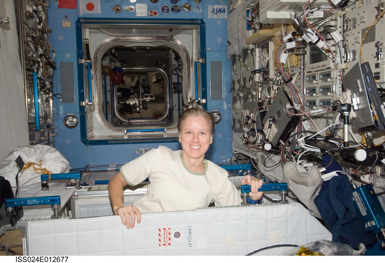 ISS024-E-012677 (30 Aug. 2010) --- NASA astronaut Shannon Walker, Expedition 24 flight engineer, is pictured in the Kibo laboratory of the International Space Station.