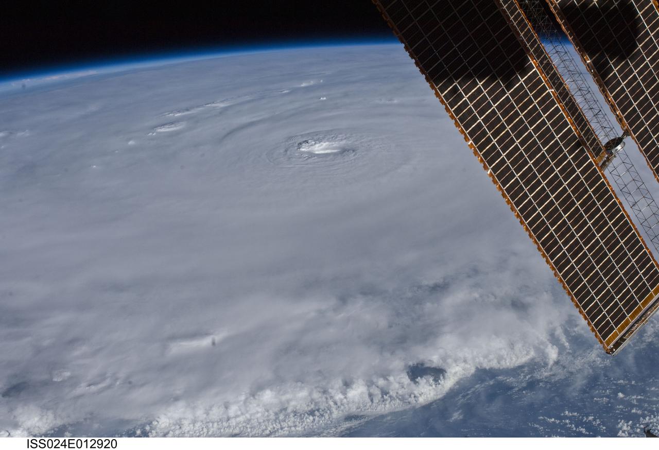 ISS024-E-012920 (30 Aug. 2010) --- Photographed by an Expedition 24 crew member on the International Space Station, this is an oblique view of the eye (just above center frame) of Hurricane Earl (at this time a category 4 but later downgraded to a category 3), centered just north of the Virgin Islands near 19.3 north latitude and 64.7 west longitude packing 115-kilometer winds. The photo was taken with a digital still camera using a 35mm lens.
