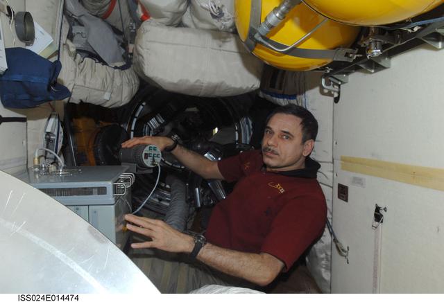 NASA image: View of FE Kornienko working with the KASKAD (Cascade) Payload