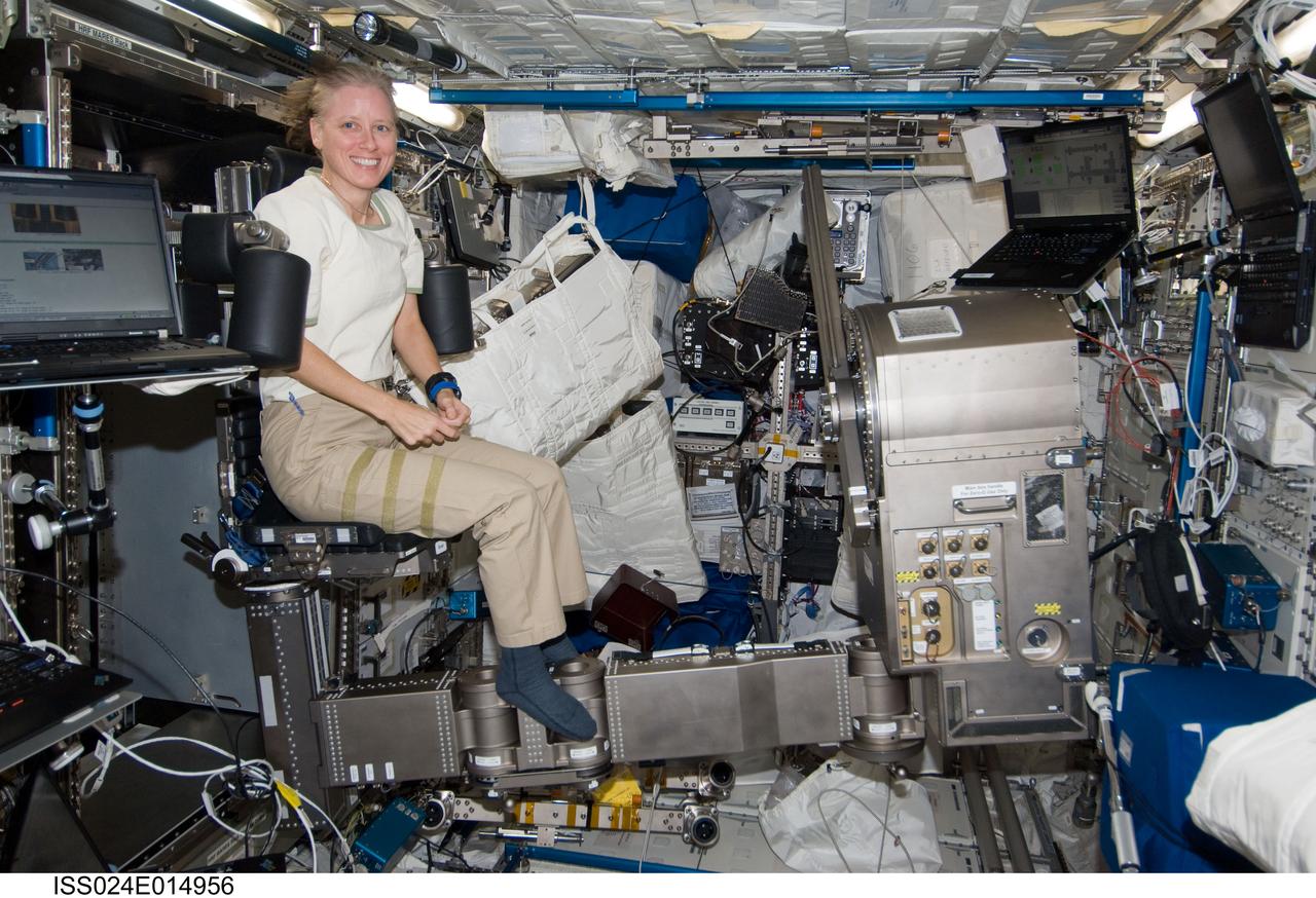 ISS024-E-014956 (16 Sept. 2010) --- NASA astronaut Shannon Walker, Expedition 24 flight engineer, works with Muscle Atrophy Resistive Exercise System (MARES) hardware during installation of MARES payload in the Columbus laboratory of the International Space Station.