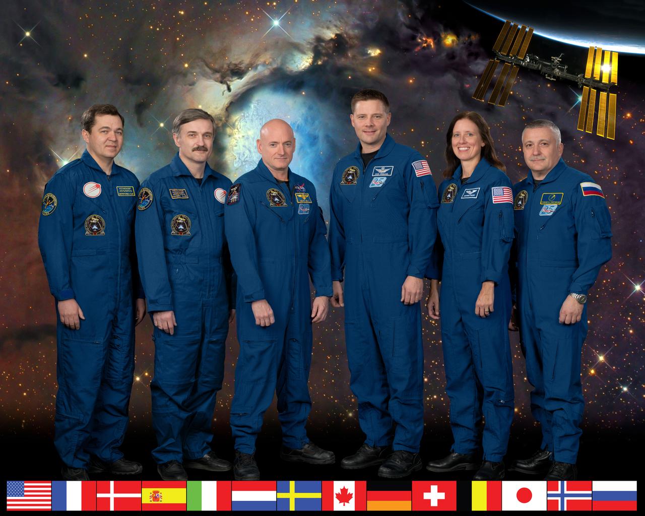 ISS025-S-002A (February 2010) --- Expedition 25 crew members take a break from training at NASA's Johnson Space Center to pose for a crew portrait. Pictured at center right is NASA astronaut Doug Wheelock, commander. Also pictured (from the left) are Russian cosmonauts Oleg Skripochka and Alexander Kaleri; NASA astronauts Scott Kelly and Shannon Walker; along with Russian cosmonaut Fyodor Yurchikhin, all flight engineers.
