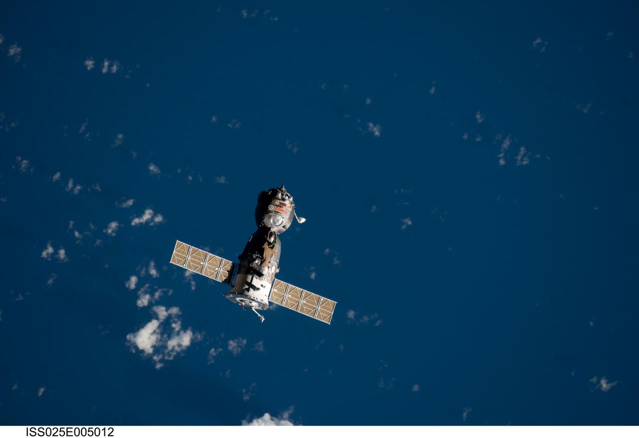 ISS025-E-005012 (24 Sept. 2010) --- The Soyuz TMA-18 spacecraft departs the International Space Station on Sept. 24, 2010. Onboard are three members of Expedition 24 ? Russian cosmonaut Alexander Skvortsov, commander; along with NASA astronaut Tracy Caldwell Dyson and Russian cosmonaut Mikhail Kornienko, both flight engineers.
