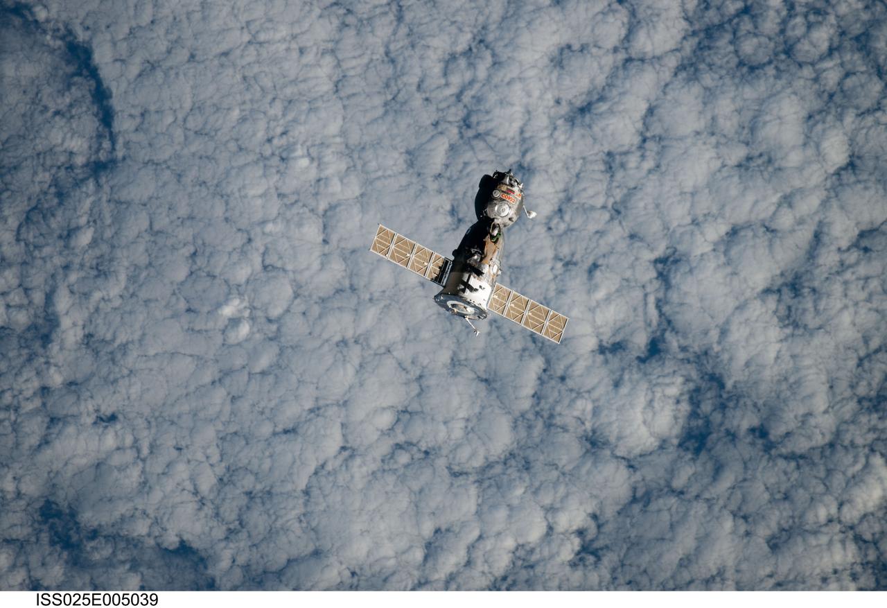 ISS025-E-005039 (24 Sept. 2010) --- The Soyuz TMA-18 spacecraft departs the International Space Station on Sept. 24, 2010. Onboard are three members of Expedition 24 ? Russian cosmonaut Alexander Skvortsov, commander; along with NASA astronaut Tracy Caldwell Dyson and Russian cosmonaut Mikhail Kornienko, both flight engineers.