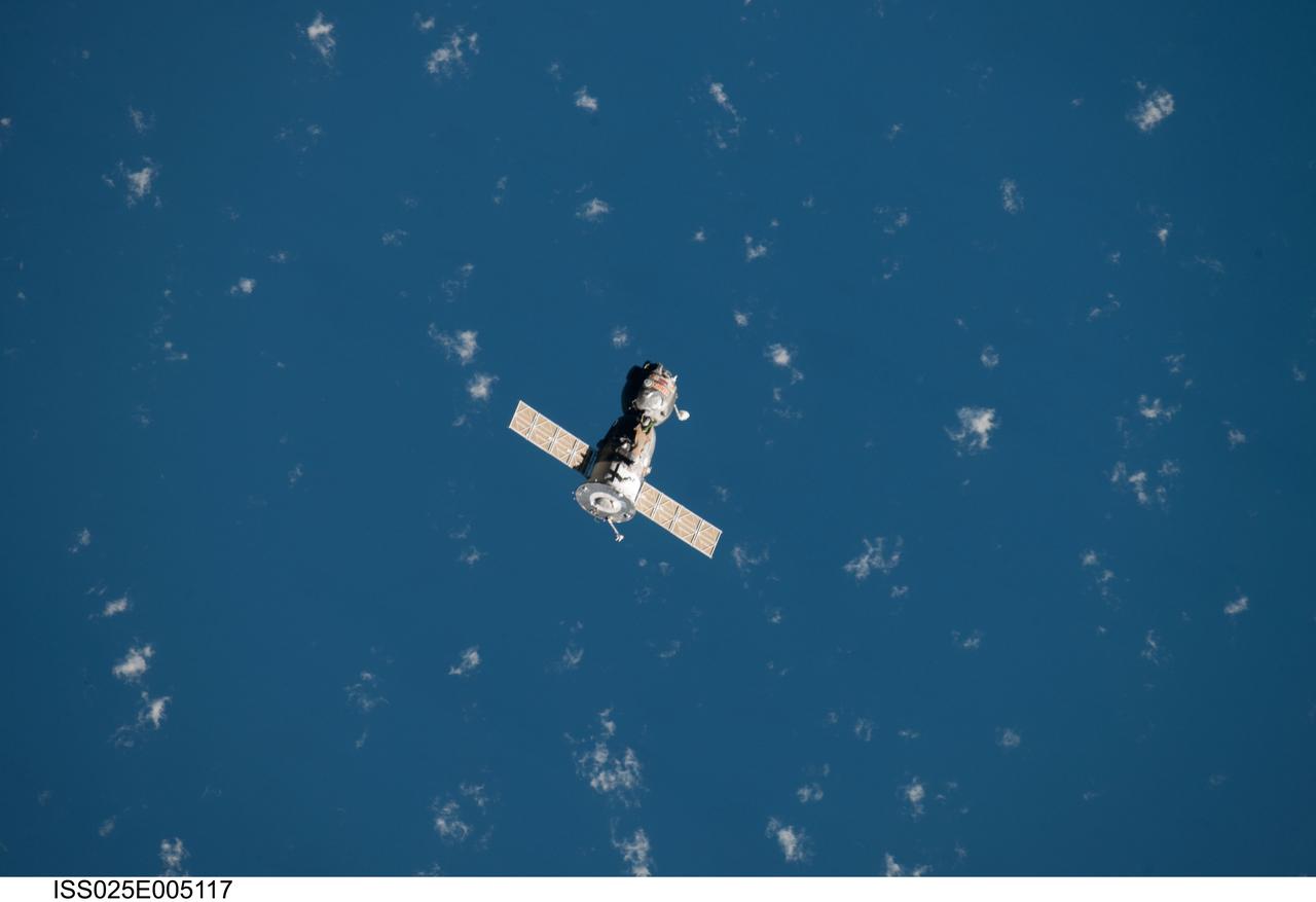 ISS025-E-005117 (24 Sept. 2010) --- The Soyuz TMA-18 spacecraft departs the International Space Station on Sept. 24, 2010. Onboard are three members of Expedition 24 ? Russian cosmonaut Alexander Skvortsov, commander; along with NASA astronaut Tracy Caldwell Dyson and Russian cosmonaut Mikhail Kornienko, both flight engineers.