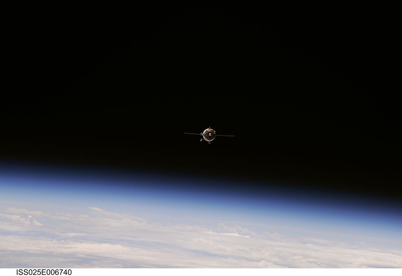 ISS025-E-006740 (9 Oct. 2010) --- The Soyuz TMA-01M spacecraft approaches the International Space Station, carrying Russian cosmonaut Alexander Kaleri, Soyuz commander and Expedition 25 flight engineer; along with NASA astronaut Scott Kelly and Russian cosmonaut Oleg Skripochka, both flight engineers. Docking of the two spacecraft occurred at 8:01 p.m. (EDT) on Oct. 9, 2010.