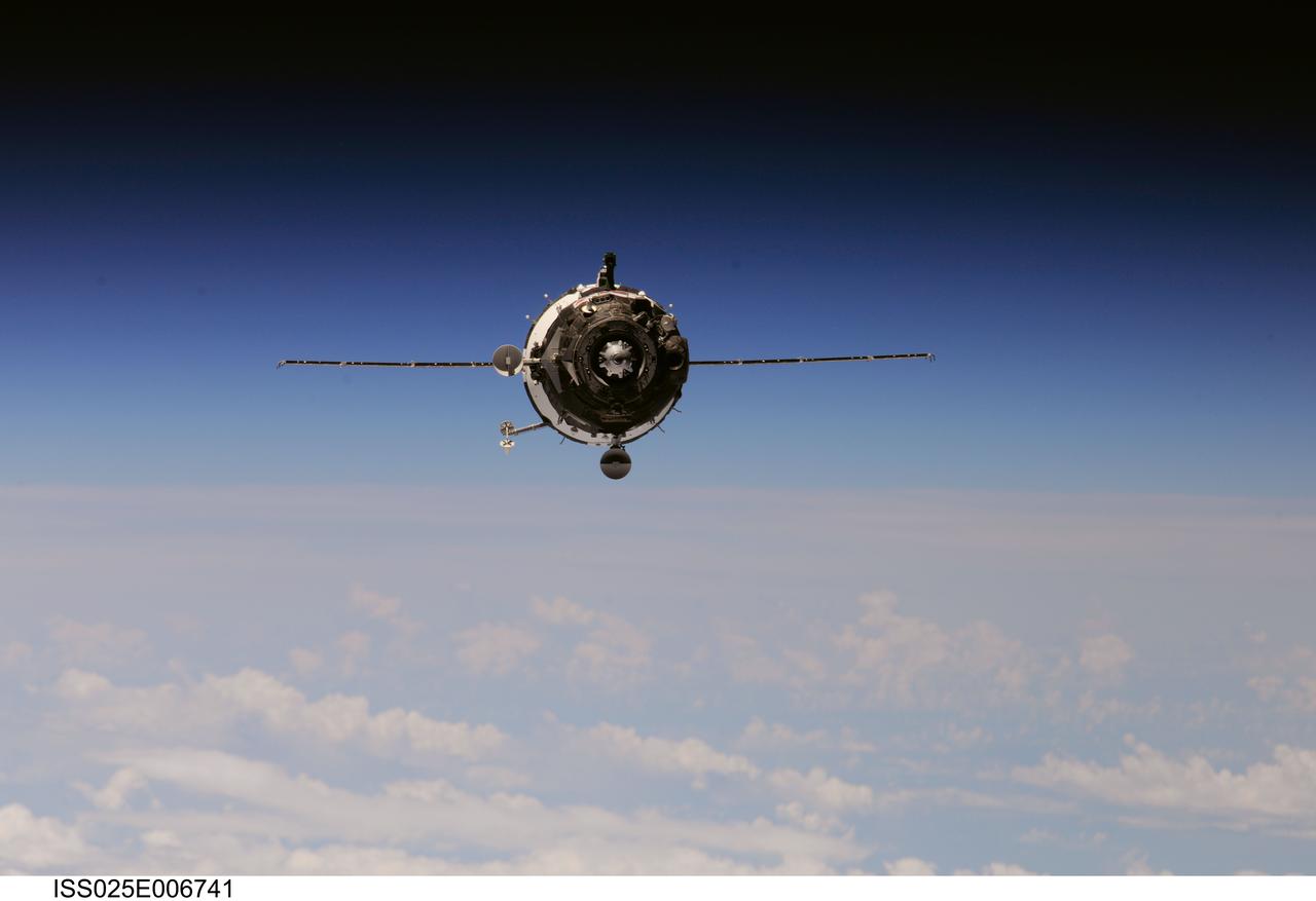 ISS025-E-006741 (9 Oct. 2010) --- The Soyuz TMA-01M spacecraft approaches the International Space Station, carrying Russian cosmonaut Alexander Kaleri, Soyuz commander and Expedition 25 flight engineer; along with NASA astronaut Scott Kelly and Russian cosmonaut Oleg Skripochka, both flight engineers. Docking of the two spacecraft occurred at 8:01 p.m. (EDT) on Oct. 9, 2010.