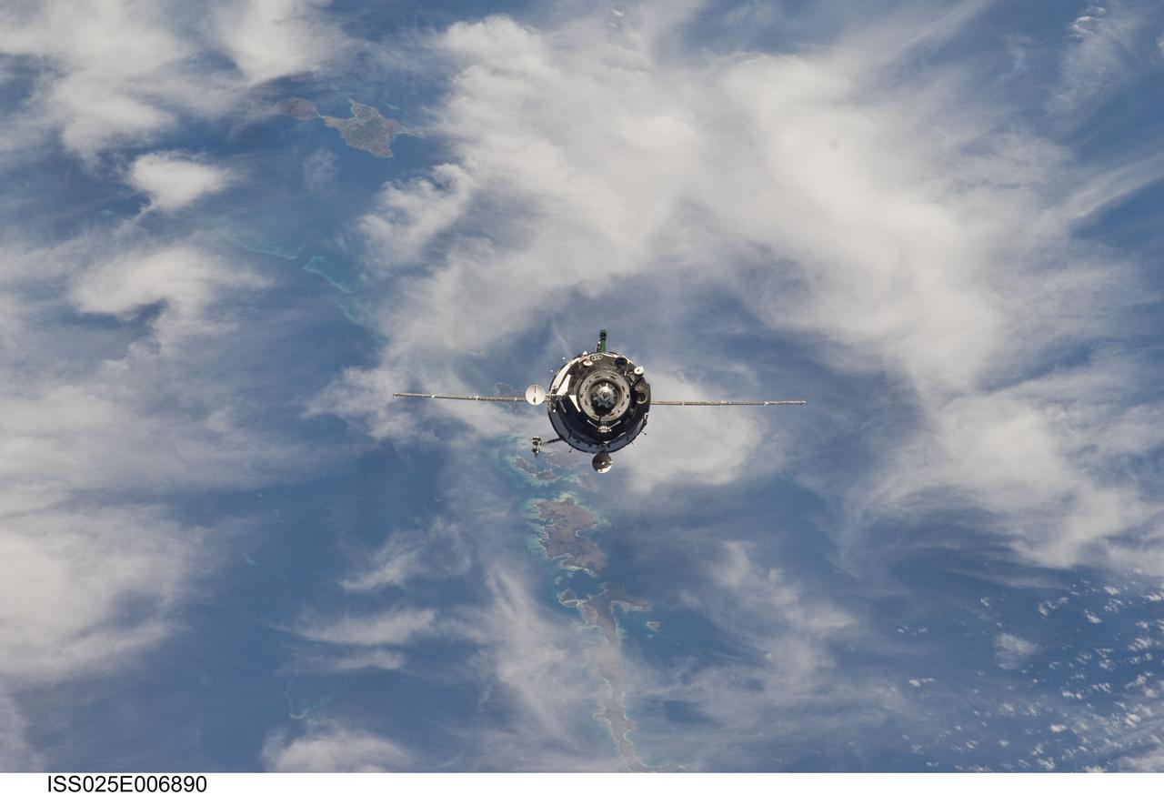 ISS025-E-006890 (9 Oct. 2010) --- The Soyuz TMA-01M spacecraft approaches the International Space Station, carrying Russian cosmonaut Alexander Kaleri, Soyuz commander and Expedition 25 flight engineer; along with NASA astronaut Scott Kelly and Russian cosmonaut Oleg Skripochka, both flight engineers. Docking of the two spacecraft occurred at 8:01 p.m. (EDT) on Oct. 9, 2010.