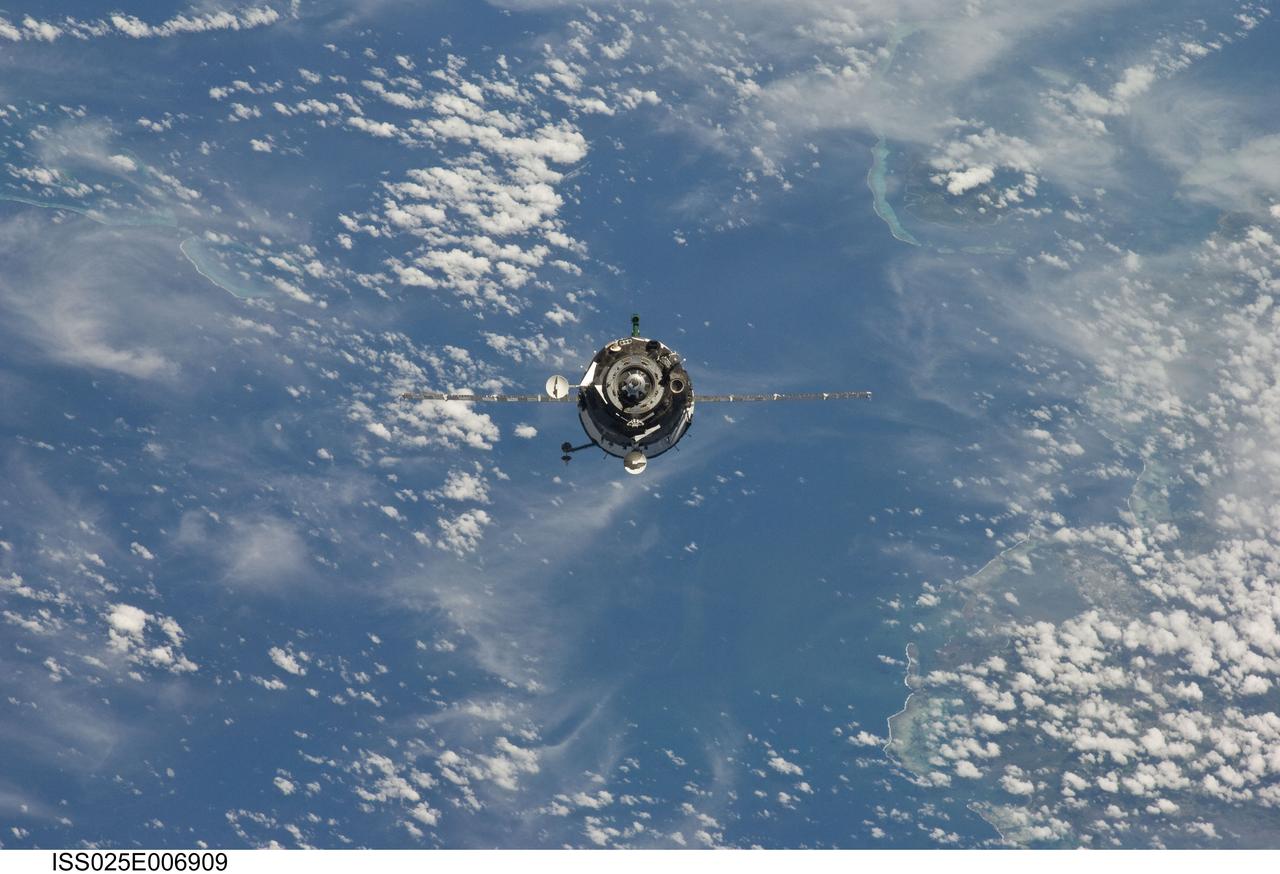 ISS025-E-006909 (9 Oct. 2010) --- The Soyuz TMA-01M spacecraft approaches the International Space Station, carrying Russian cosmonaut Alexander Kaleri, Soyuz commander and Expedition 25 flight engineer; along with NASA astronaut Scott Kelly and Russian cosmonaut Oleg Skripochka, both flight engineers. Docking of the two spacecraft occurred at 8:01 p.m. (EDT) on Oct. 9, 2010.