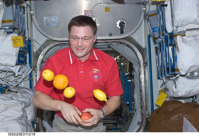 NASA image: Wheelock in Node 1 with fruit