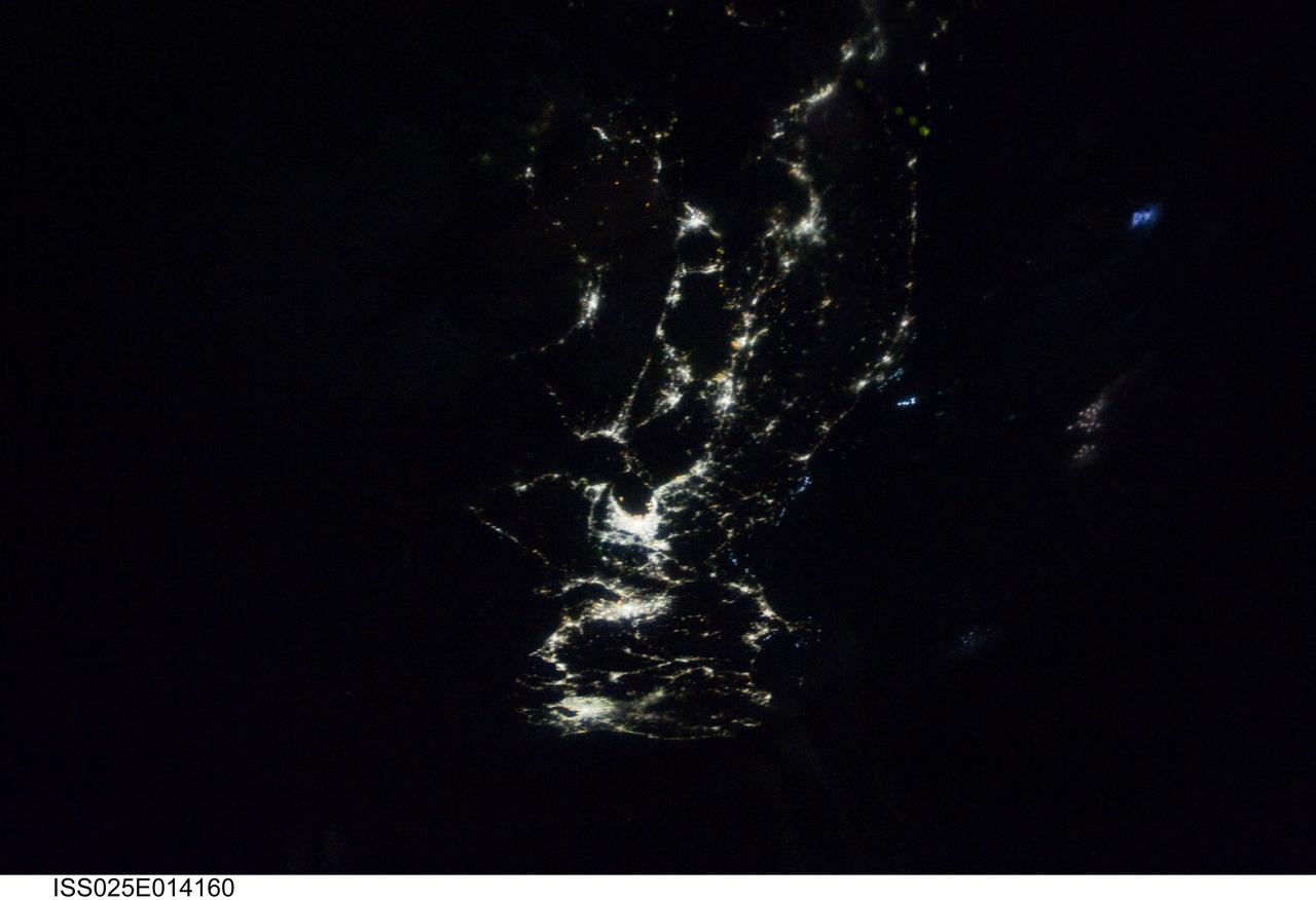 ISS025-E-014160 (11 Nov. 2010) --- From 220 miles above Earth, one of the Expedition 25 crew members exposed this night time image of part of Japan on Nov. 11, 2010, as three members of the six person crew began their final fortnight aboard the orbiting complex.