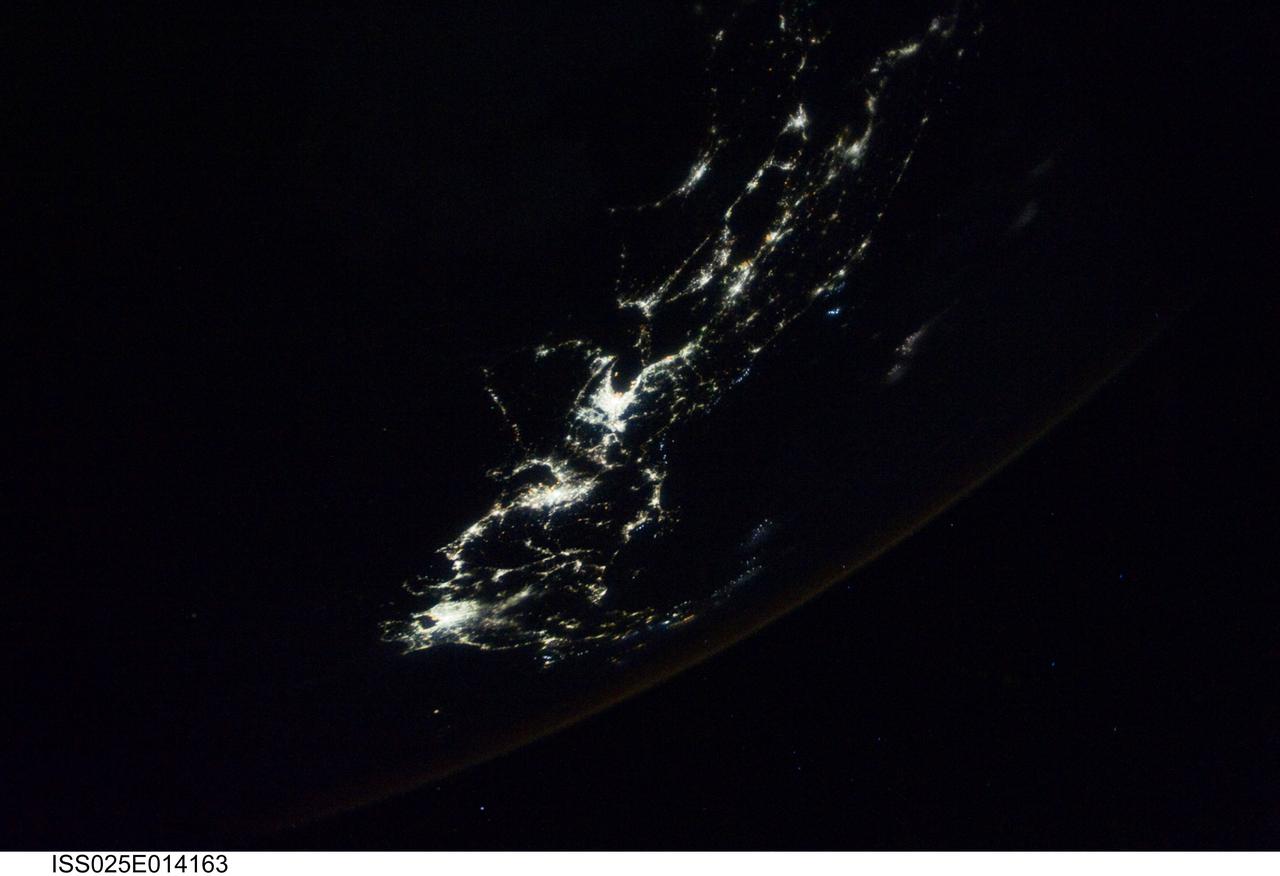 ISS025-E-014163 (11 Nov. 2010) --- From 220 miles above Earth, one of the Expedition 25 crew members exposed this night time image of part of Japan on Nov. 11, 2010, as three members of the six person crew began their final fortnight aboard the orbiting complex.