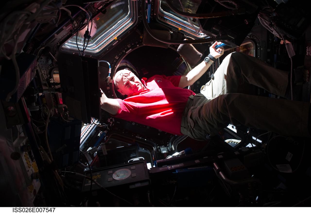 ISS026-E-007547 (5 Dec. 2010) --- NASA astronaut Scott Kelly, Expedition 26 commander, is pictured near the windows in the Cupola of the International Space Station.