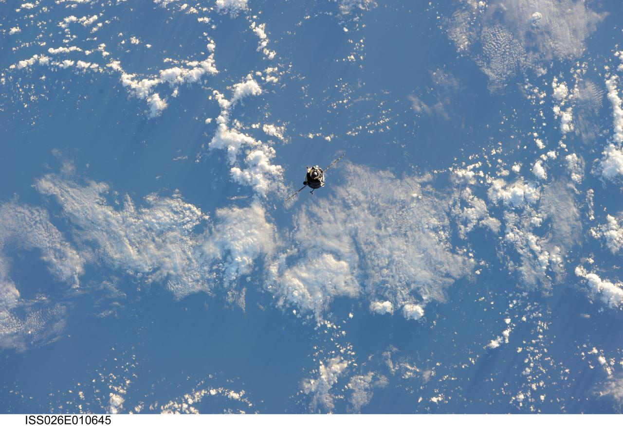 ISS026-E-010645 (17 Dec. 2010) --- The Soyuz TMA-20 spacecraft approaches the International Space Station, carrying Russian cosmonaut Dmitry Kondratyev, Soyuz commander and Expedition 26 flight engineer; along with NASA astronaut Catherine (Cady) Coleman and European Space Agency astronaut Paolo Nespoli, both flight engineers. Docking of the two spacecraft occurred at 3:11 p.m. (EST) on Dec. 17, 2010.