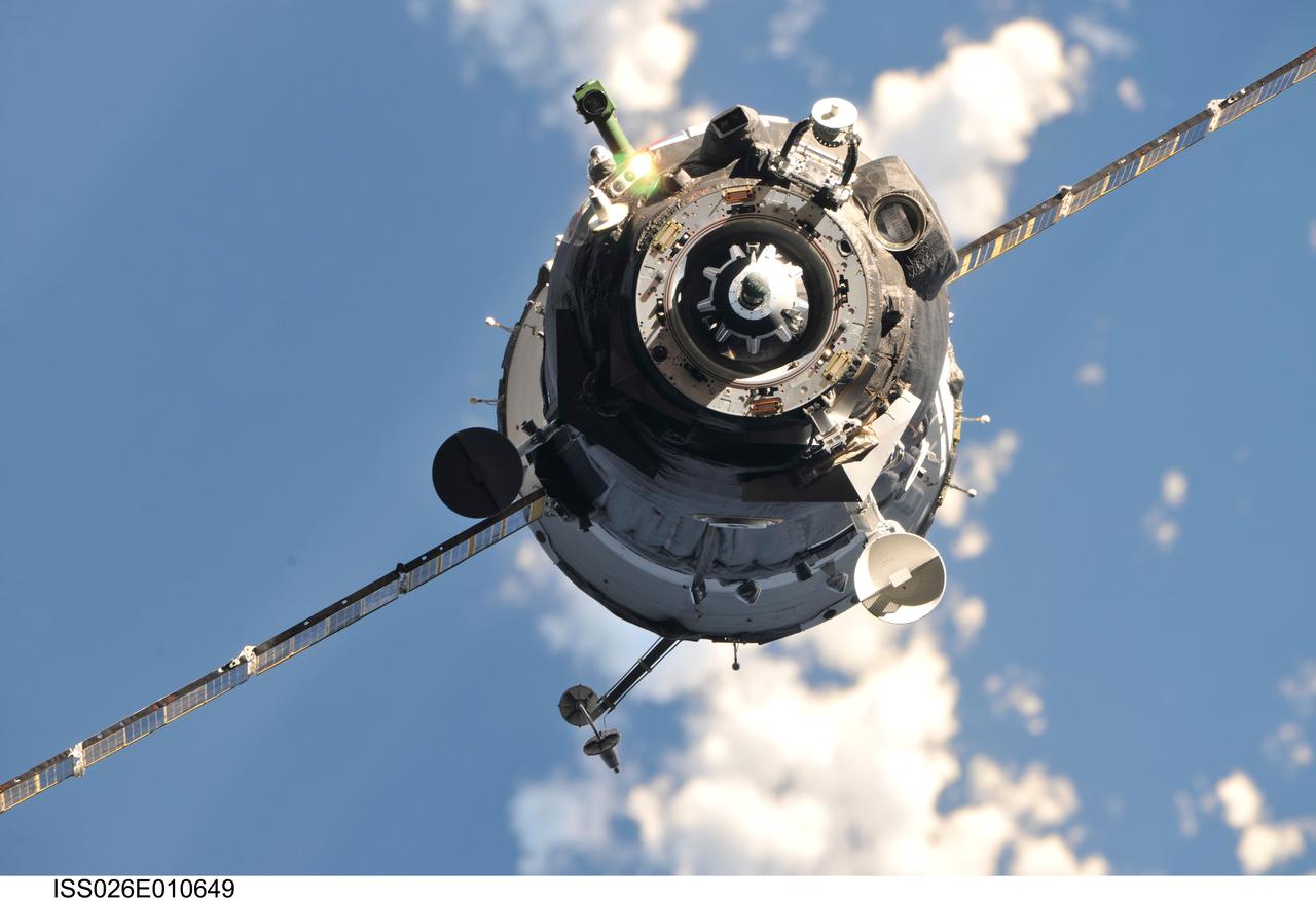 ISS026-E-010649 (17 Dec. 2010) --- The Soyuz TMA-20 spacecraft approaches the International Space Station, carrying Russian cosmonaut Dmitry Kondratyev, Soyuz commander and Expedition 26 flight engineer; along with NASA astronaut Catherine (Cady) Coleman and European Space Agency astronaut Paolo Nespoli, both flight engineers. Docking of the two spacecraft occurred at 3:11 p.m. (EST) on Dec. 17, 2010.