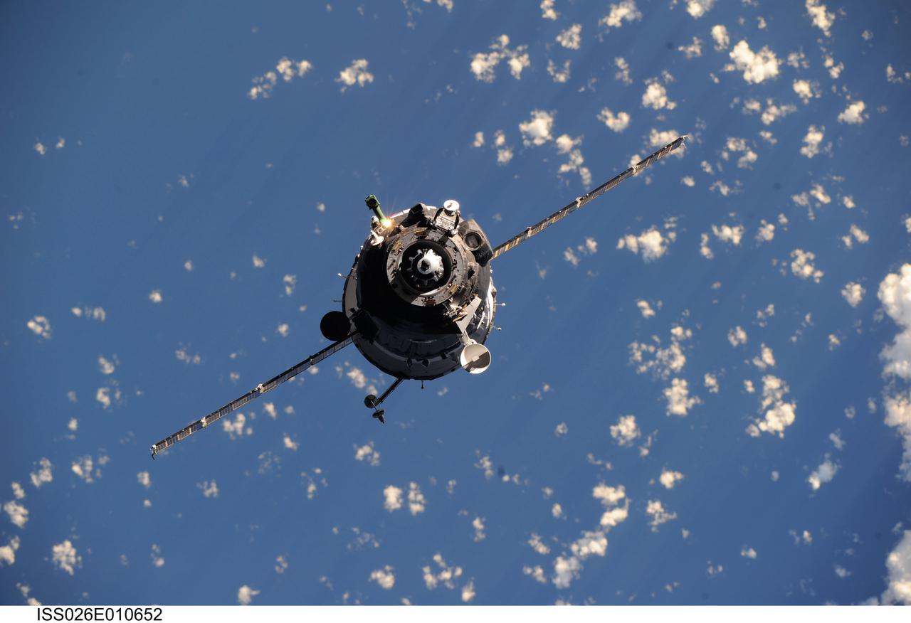 ISS026-E-010652 (17 Dec. 2010) --- The Soyuz TMA-20 spacecraft approaches the International Space Station, carrying Russian cosmonaut Dmitry Kondratyev, Soyuz commander and Expedition 26 flight engineer; along with NASA astronaut Catherine (Cady) Coleman and European Space Agency astronaut Paolo Nespoli, both flight engineers. Docking of the two spacecraft occurred at 3:11 p.m. (EST) on Dec. 17, 2010.