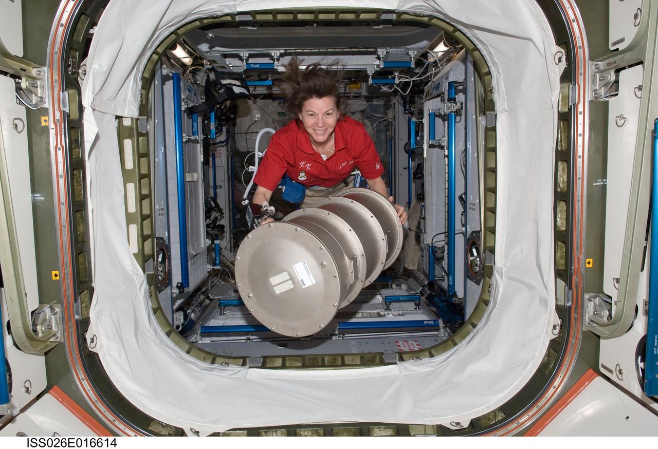 ISS026-E-016614 (7 Jan. 2011) --- NASA astronaut Catherine (Cady) Coleman, Expedition 26 flight engineer, moves Material Science Laboratory (MSL) hardware from the Harmony node to the Destiny laboratory of the International Space Station.