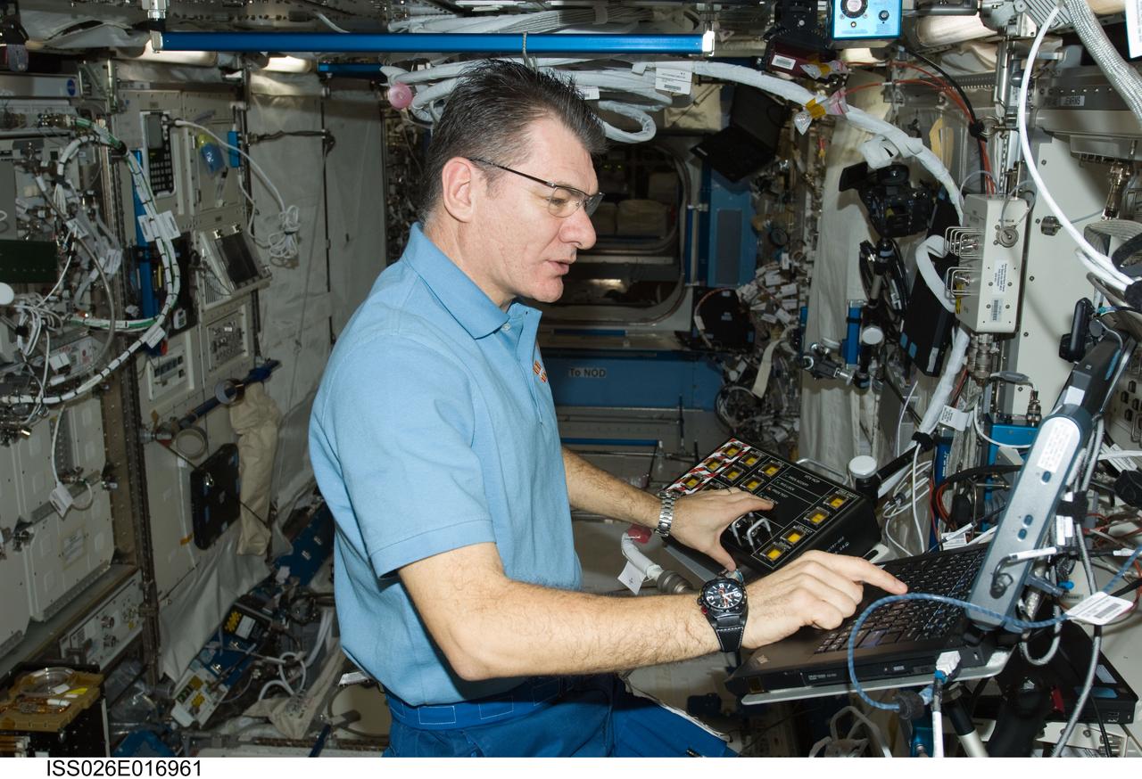 ISS026-E-016961 (11 Jan. 2011) --- European Space Agency astronaut Paolo Nespoli, Expedition 26 flight engineer, continues his board-side support of the on-going ground-controlled H-II Transfer Vehicle / Hardware Command Panel (HTV HCP) checkout activities in the Kibo laboratory of the International Space Station.