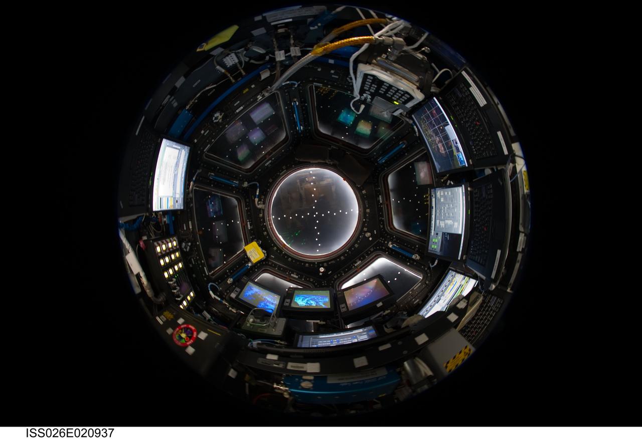 ISS026-E-020937 (27 Jan. 2011) --- An Expedition 26 crew member used a fish-eye lens attached to an electronic still camera to capture this image of the Cupola of the International Space Station.