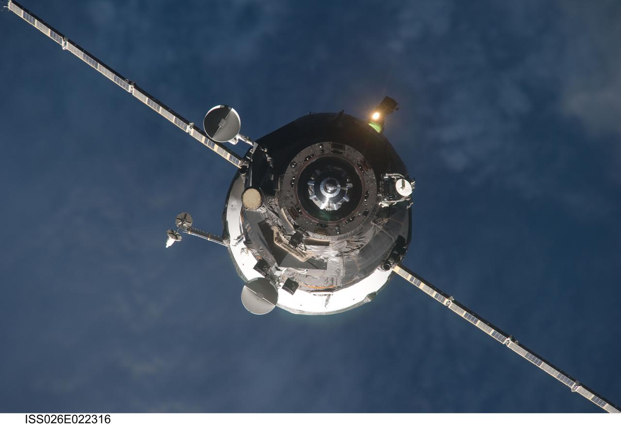 ISS026-E-022316 (29 Jan. 2011) --- An unpiloted ISS Progress resupply vehicle approaches the International Space Station, bringing 1,918 pounds of propellant, 110 pounds of oxygen, 926 pounds of water and 3,080 pounds of spare parts and supplies for the Expedition 26 crew members. Progress 41 docked to the station’s Pirs Docking Compartment at 9:39 p.m. (EST) on Jan. 29, 2011.