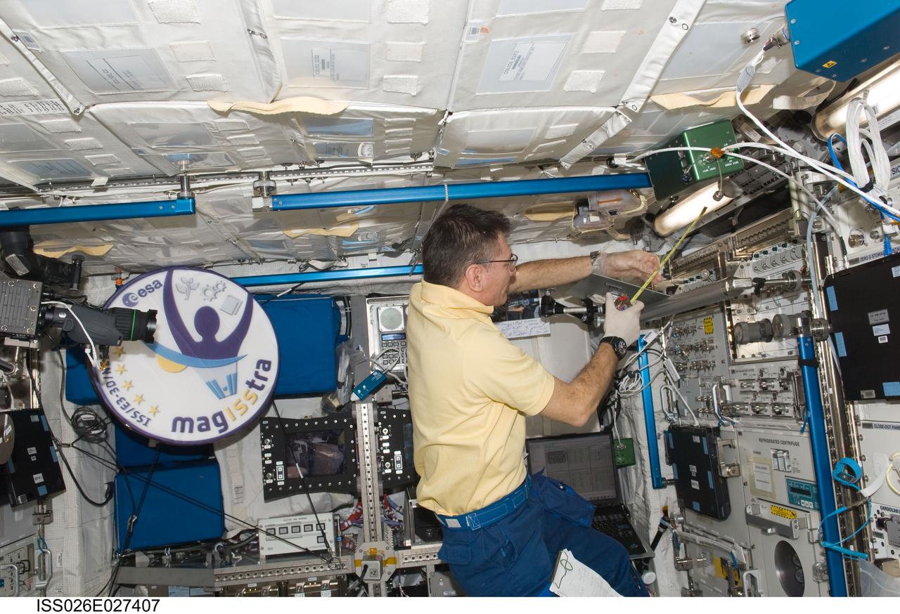 ISS026-E-027407 (16 Feb. 2011) --- European Space Agency astronaut Paolo Nespoli, Expedition 26 flight engineer, works in the Columbus laboratory of the International Space Station.