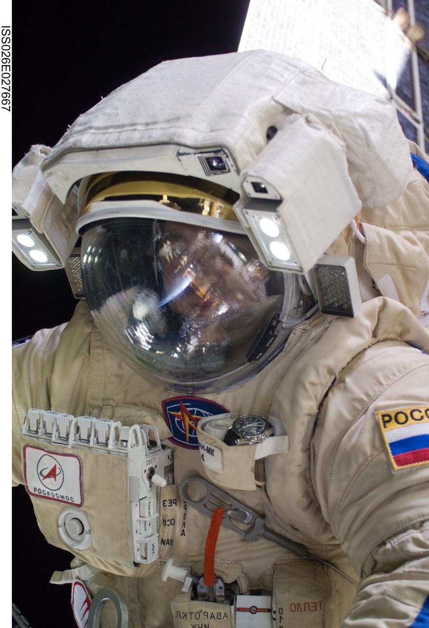 ISS026-E-027667 (16 Feb. 2011) --- Russian cosmonaut Oleg Skripochka, Expedition 26 flight engineer, wearing a Russian Orlan-MK spacesuit, participates in a session of extravehicular activity (EVA) focused on the installation of two scientific experiments outside the Zvezda Service Module of the International Space Station. During the four-hour, 51-minute spacewalk, Skripochka and Russian cosmonaut Dmitry Kondratyev (out of frame), flight engineer, installed a pair of earthquake and lightning sensing experiments and retrieved a pair of spacecraft material evaluation panels.