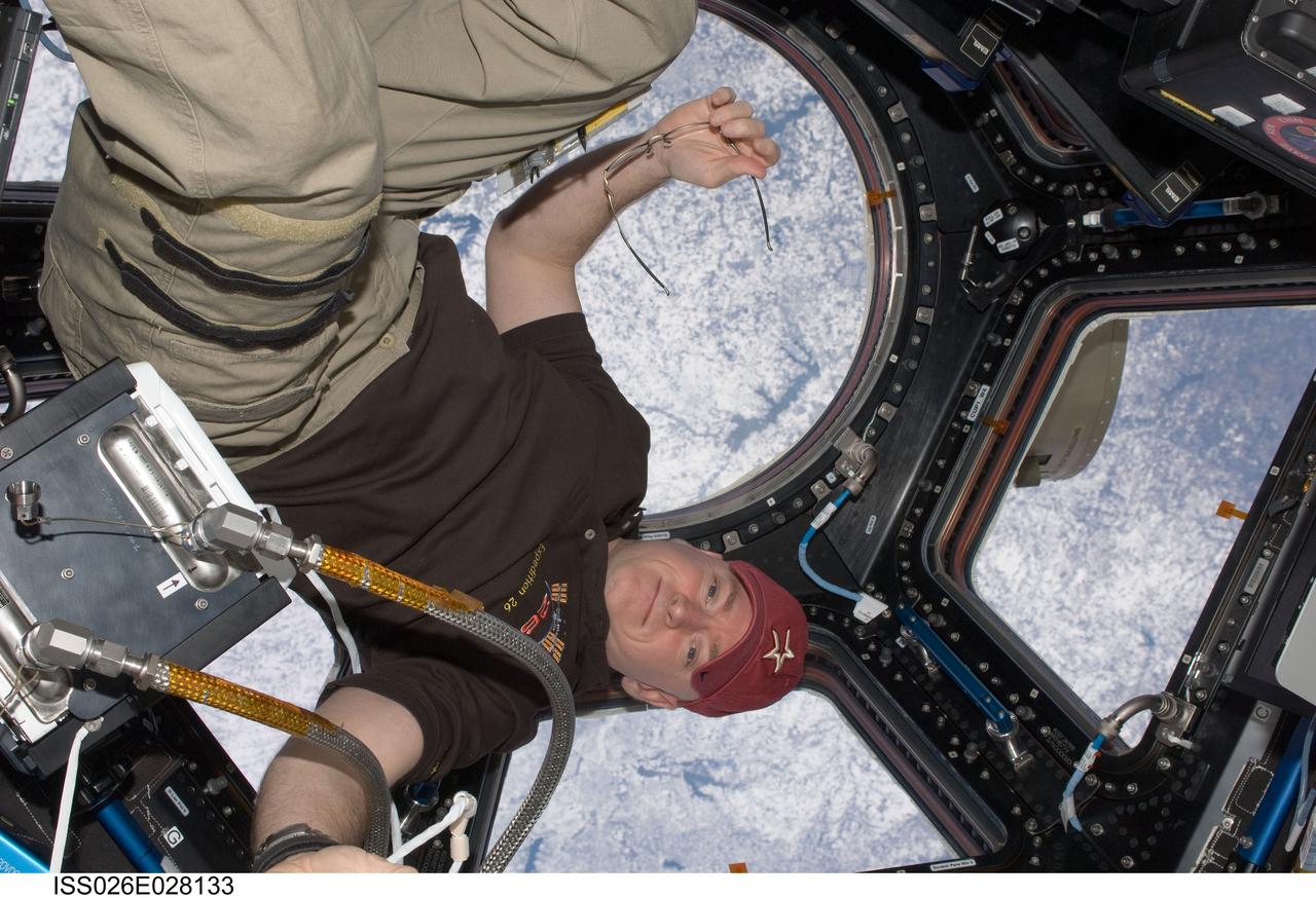 ISS026-E-028133 (5 Feb. 2011) --- NASA astronaut Scott Kelly, Expedition 26 commander, is pictured in the Cupola of the International Space Station.