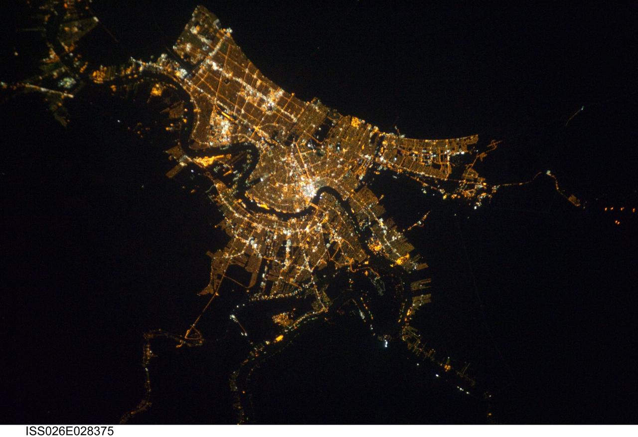 ISS026-E-028375 (22 Feb. 2011) --- Having enjoyed a clear sky nocturnal photo opportunity over New Orleans earlier (Jan. 26) in their mission, Expedition 26 crew members aboard the International Space Station had another window on Feb. 22 to capture images of the Crescent City or Big Easy from 220 miles above Earth.  The Mississippi River is visible winding its way through the city. A 200-mm lens was used to take the picture.
