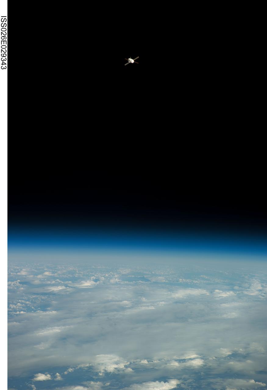 ISS026-E-029343 (24 Feb. 2011) --- Backdropped by the blackness of space and Earth’s horizon, the European Space Agency's "Johannes Kepler" Automated Transfer Vehicle-2 (ATV-2) appears very small as it approaches the International Space Station. Docking of the two spacecraft occurred at 10:59 a.m. (EST) on Feb. 24, 2011.